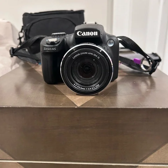 Canon Black DSLR Camera with Multicolor Strap